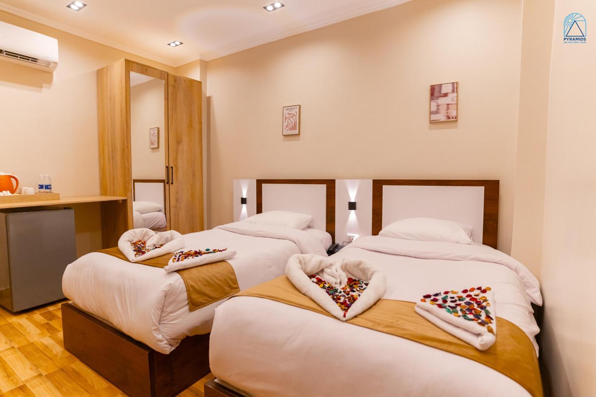 Hotel Pyramids On The Spot View Kafret el-Gabal Esterno foto