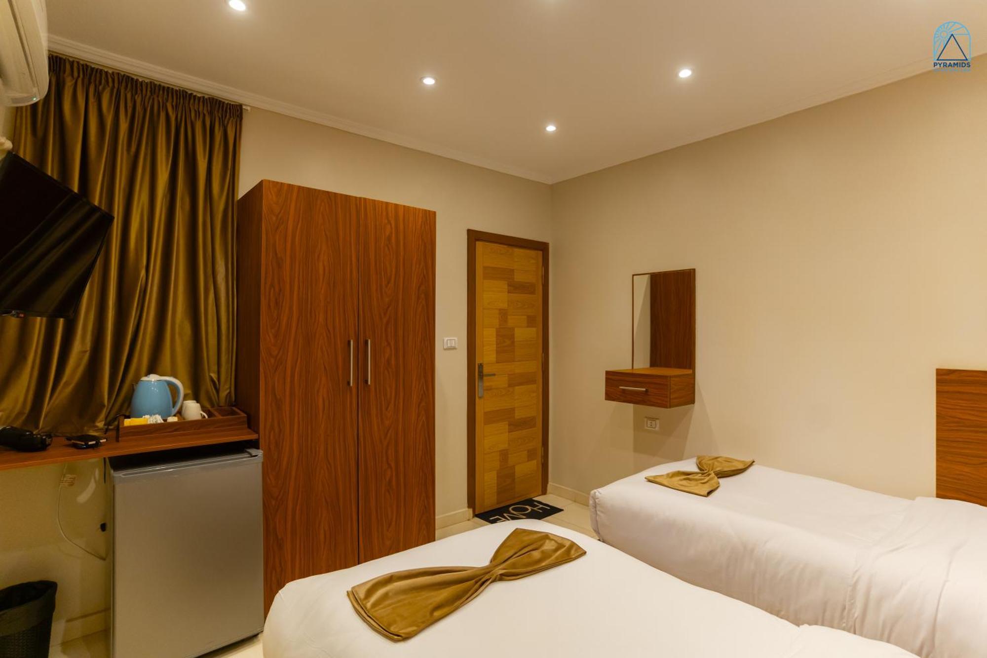 Hotel Pyramids On The Spot View Kafret el-Gabal Esterno foto