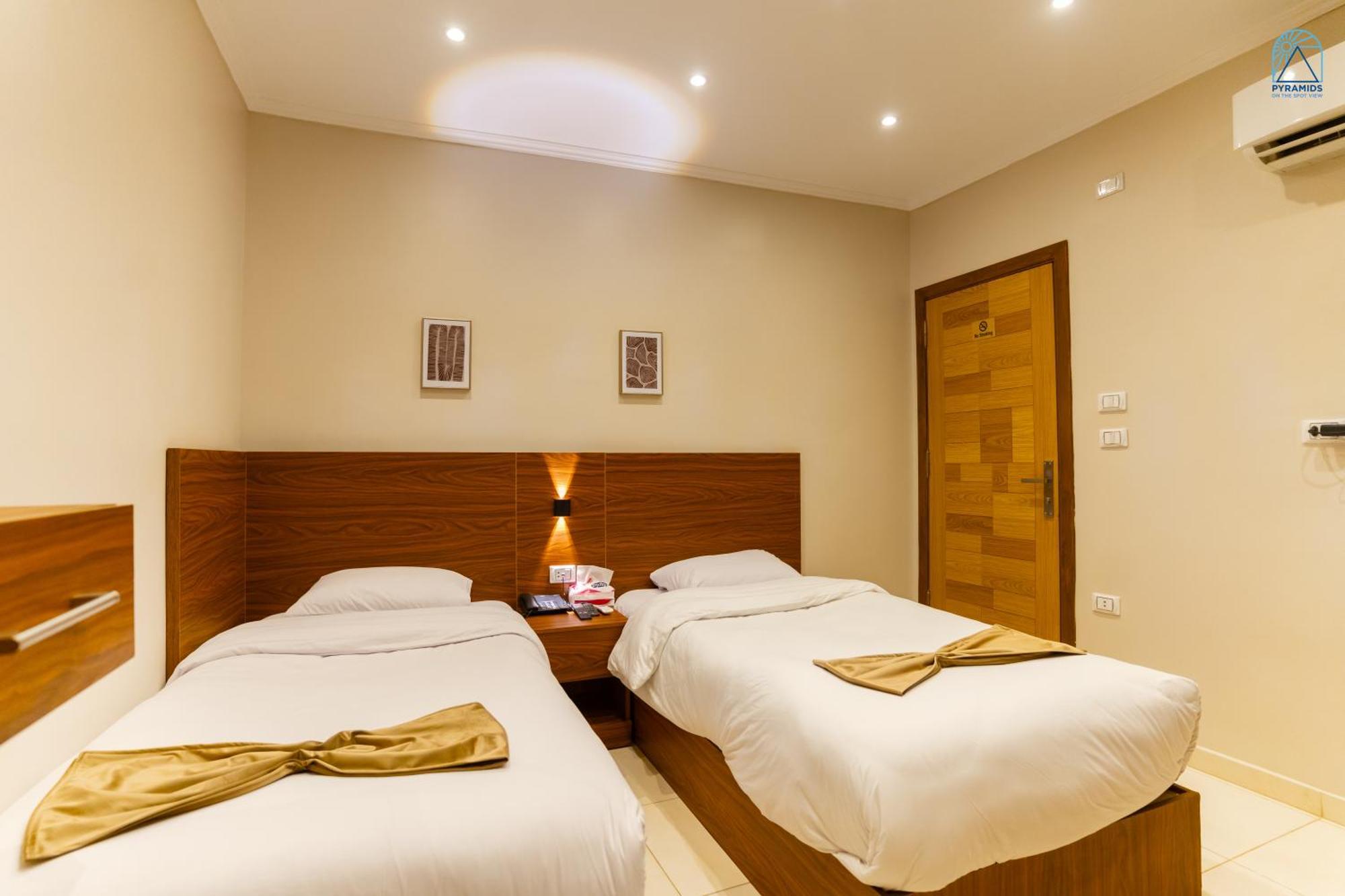 Hotel Pyramids On The Spot View Kafret el-Gabal Esterno foto