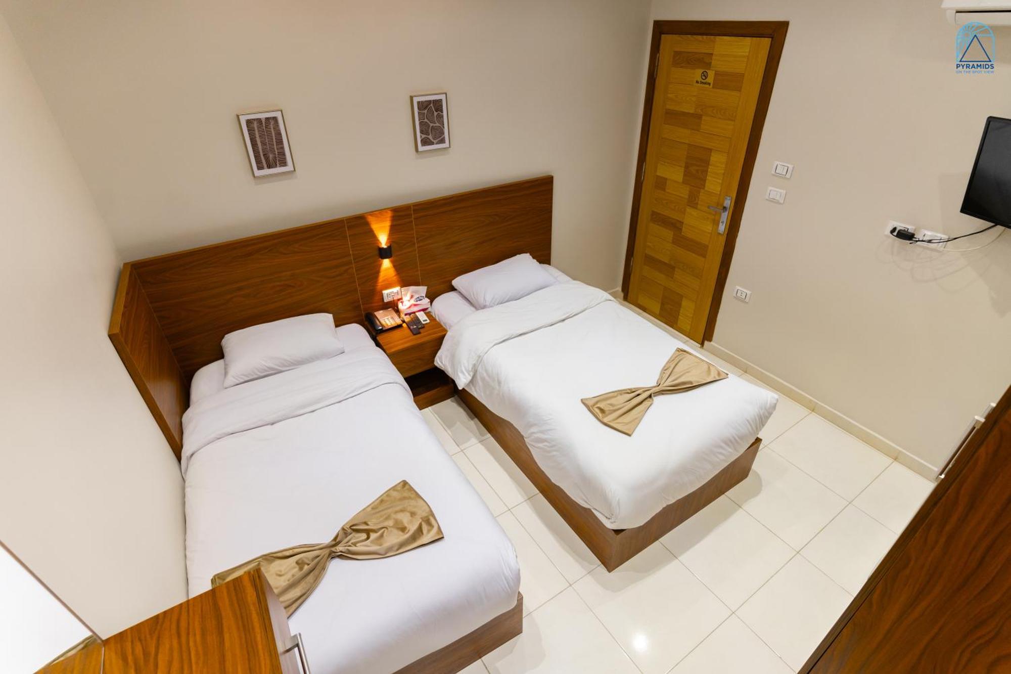 Hotel Pyramids On The Spot View Kafret el-Gabal Esterno foto
