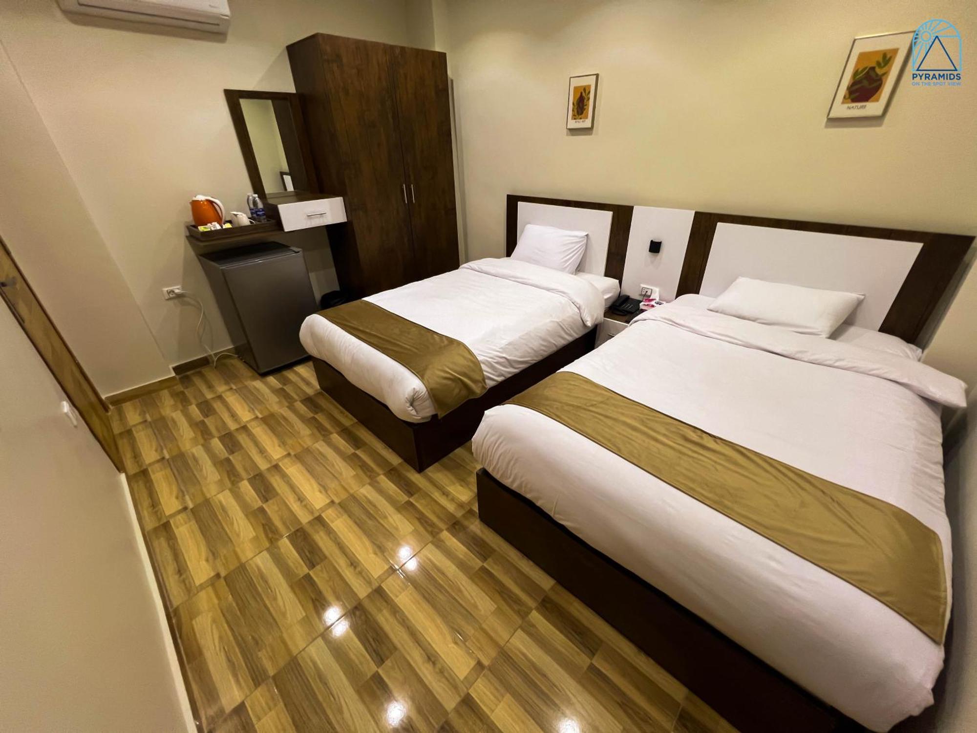 Hotel Pyramids On The Spot View Kafret el-Gabal Esterno foto